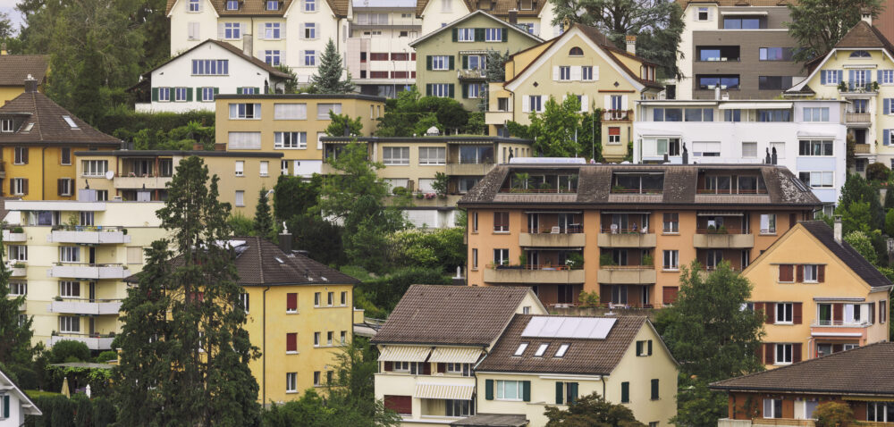 Various apartment buildings along a hillside in Lucerne, Switzerland.